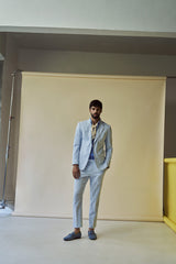 White and blue seersucker suit