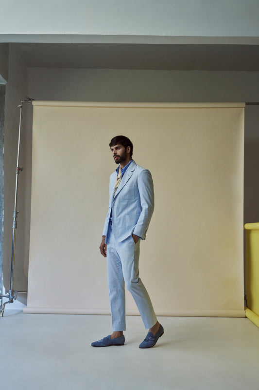 White and blue seersucker suit